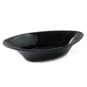 Black Marin plastic serving bowl placed elegantly on a dining table