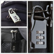Compact 3-digit combination travel lock attached to bag zipper