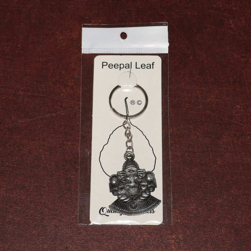 Lord Ganesha keychain packaged in Peepal leaf blister pack