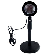 Sunset Projection Lamp demonstrating its 360-degree rotation capability.
