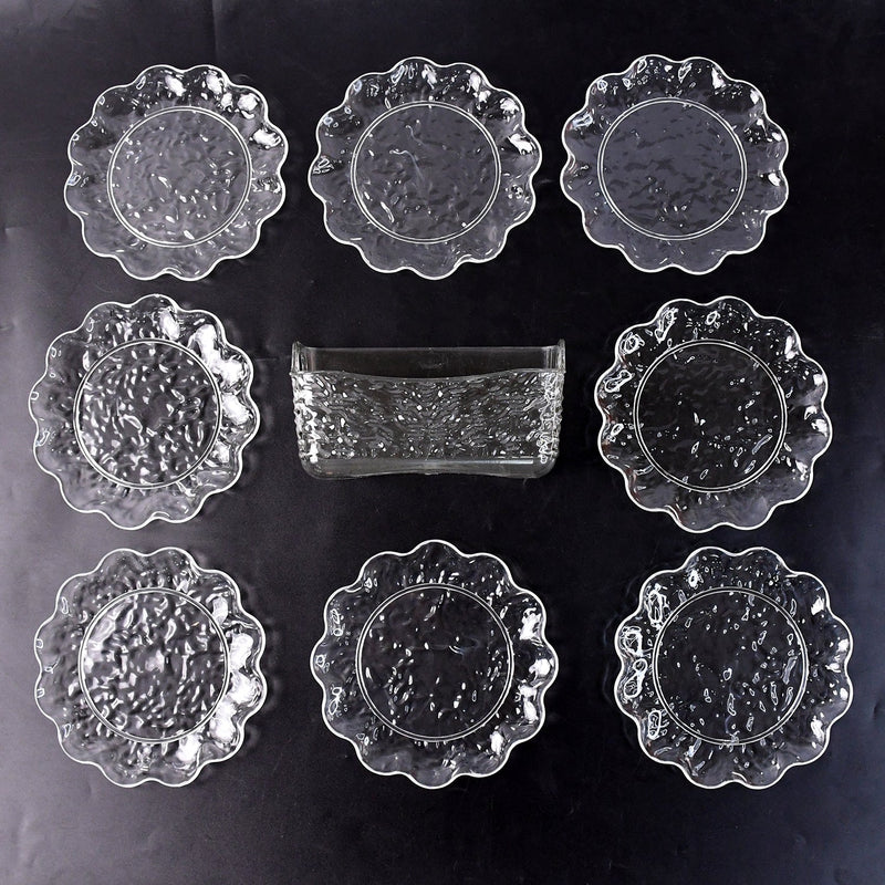 9-piece plastic bowl set with serving tray displaying transparent bowls and plates