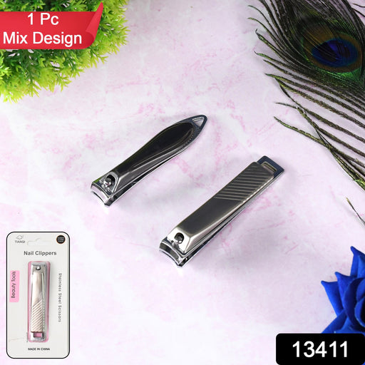 Open stainless steel folding nail clippers revealing the integrated nail file.