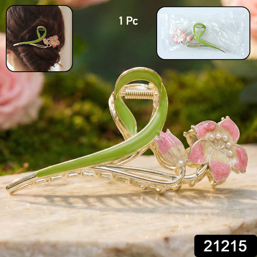 Open floral hair claw clip showing strong spring mechanism