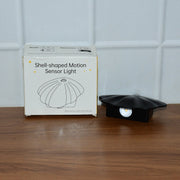 LED sensor light in elegant shell design for bedroom use