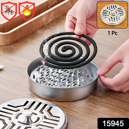 Close up of mosquito coil holder with smoke vent lid showing secure coil placement