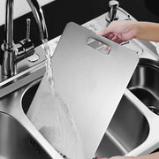 Modern kitchen stainless steel cutting board for versatile food preparation