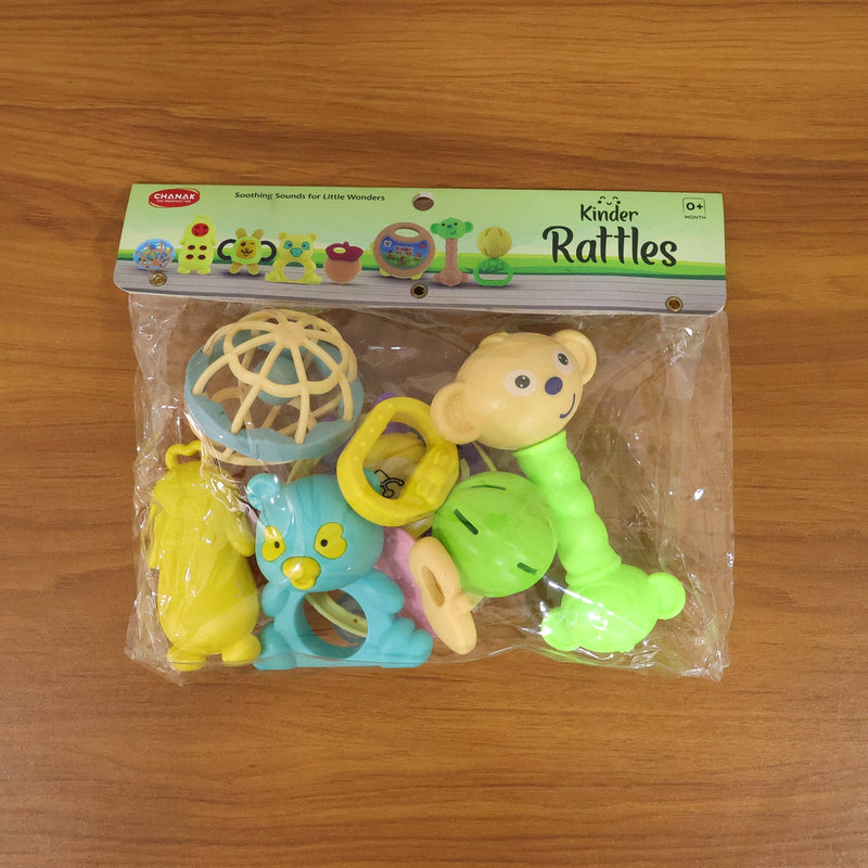 Overhead view of a neatly arranged collection of engaging baby rattles.