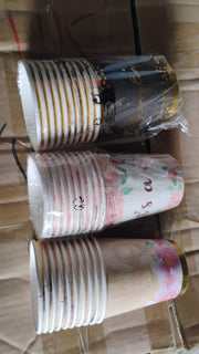 Mixed-design disposable paper cups stacked neatly, convenient for storage.