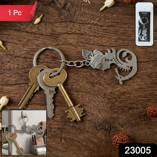 Artistic Krishna key ring with flute and peacock feather details
