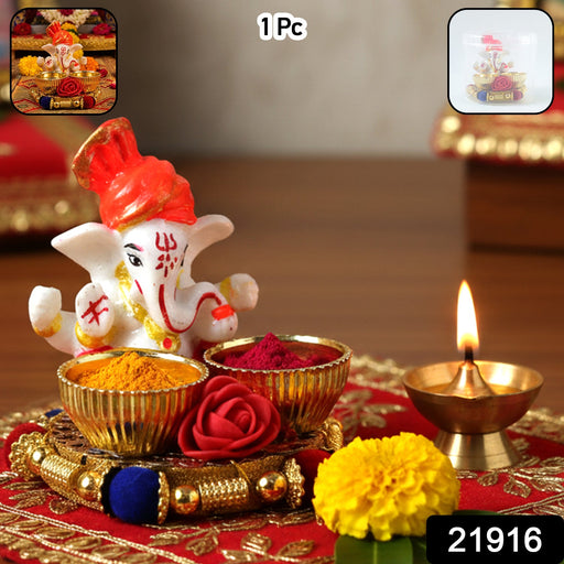 Decorative Ganesha thali with kumkum and haldi bowls for festival puja