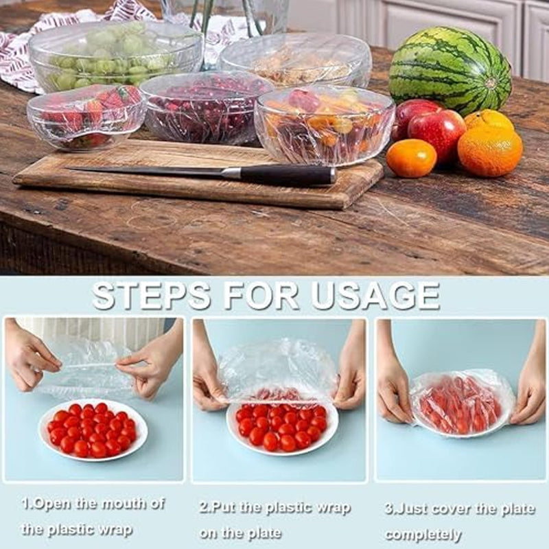 Elastic food covers protecting dishes from insects at an outdoor picnic setting.