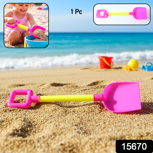 Child holding kids beach sand shovel digging sand at the beach
