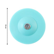 Soft silicone drain protector placed on floor shower drain