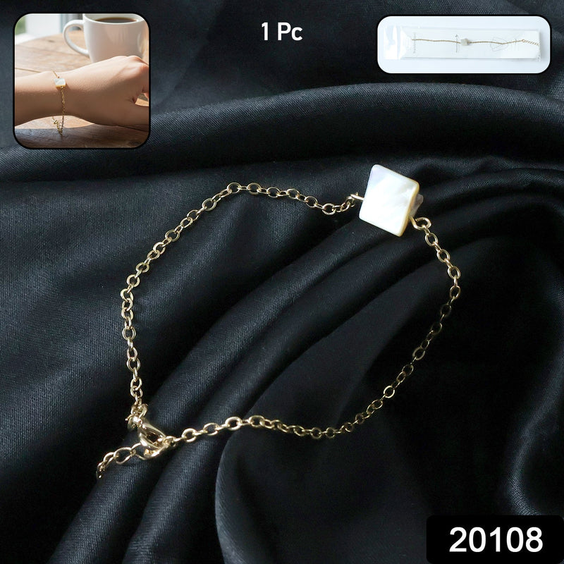 Adjustable chain bracelet worn on wrist showcasing minimalist square stone charm