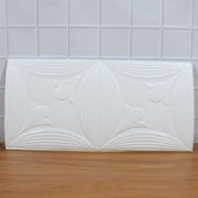 Textured white floral 3D foam wallpaper panel enhancing home interior aesthetics