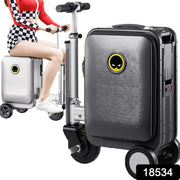 Person riding the  Electric Scooter Suitcase through an airport terminal, showcasing effortless mobility.