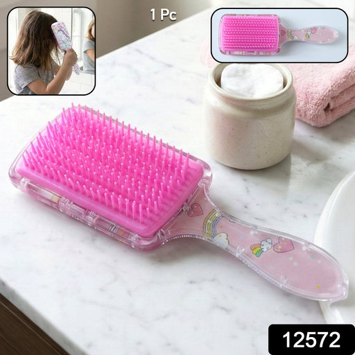 Kids hairbrush showing soft bristles and printed design