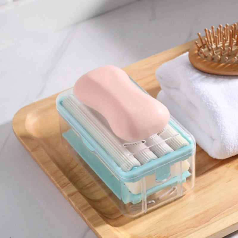 Portable detergent bar holder with a built-in roller brush, ideal for travel.