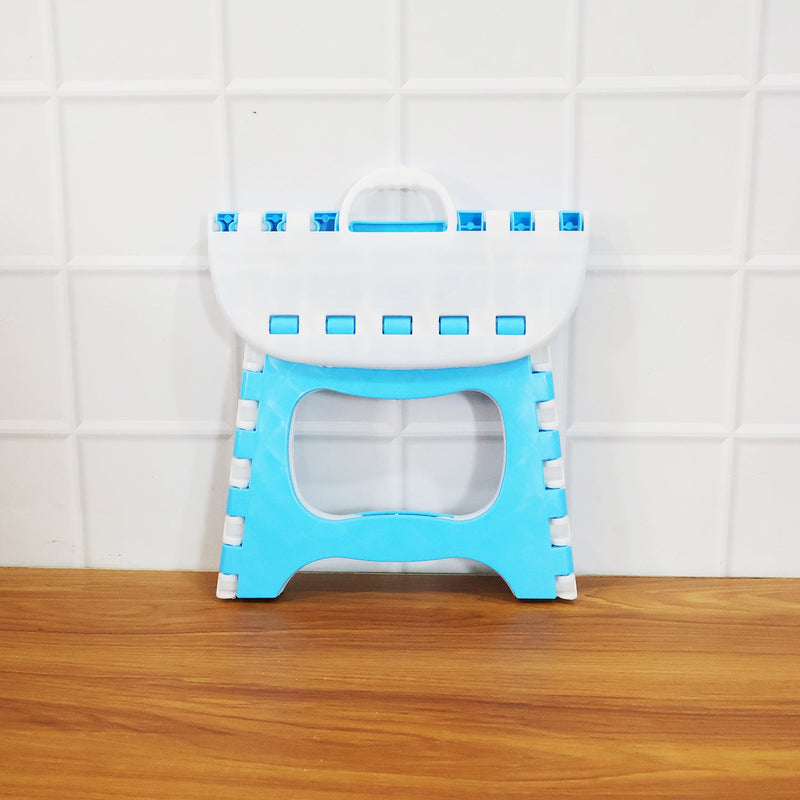 Side view of foldable step stool highlighting slim portable design