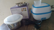Electric Lunch Box showing the included egg steaming tray and an additional food container.