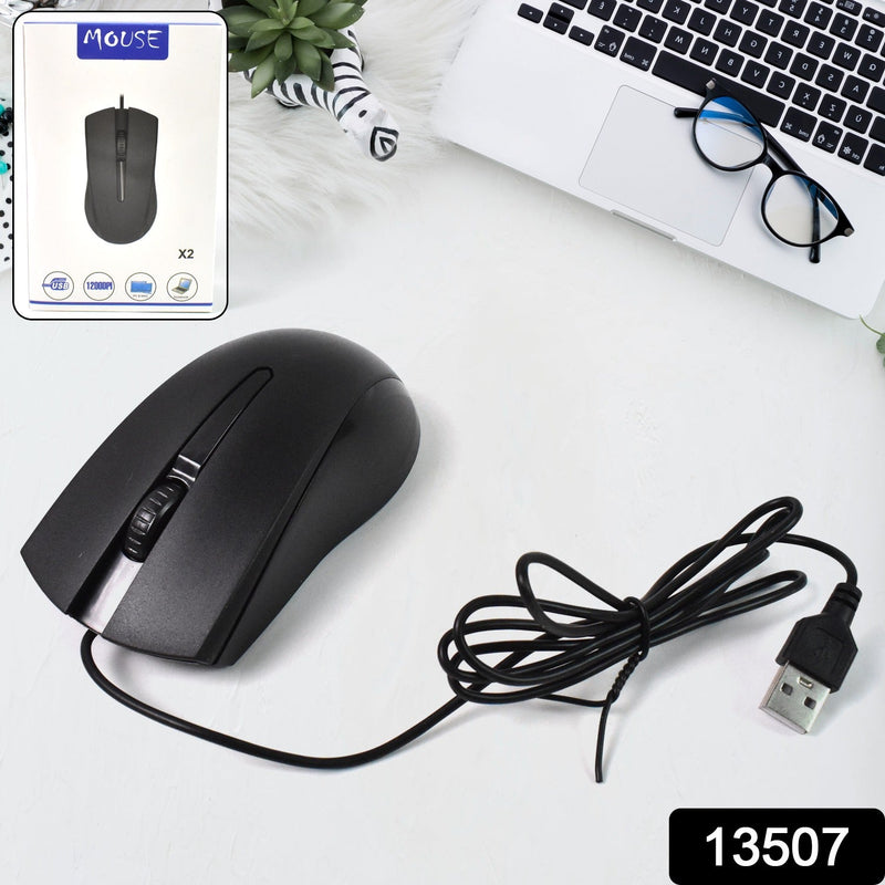 Close-up of the ergonomic Compshop X2 Wired Optical Mouse, highlighting its comfortable grip.
