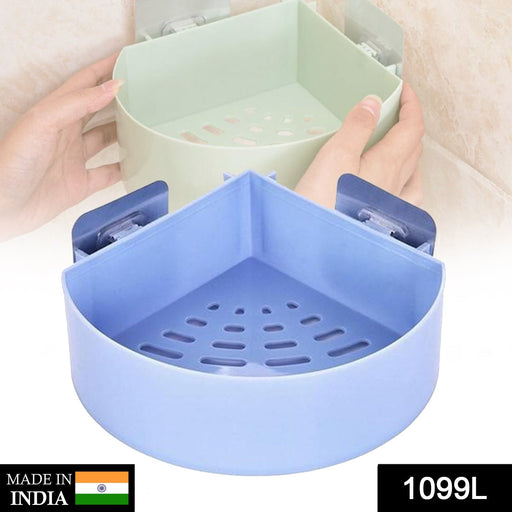 Kitchen wall holder with compartments and hooks, perfect for organizing utensils.