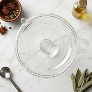 Close-up of transparent funnel design showing spout and handle