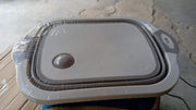 Top-down view of the collapsible cutting board and dish tub combo.