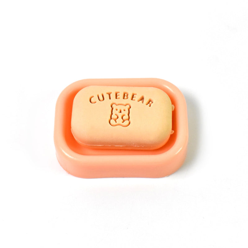 Assorted soap-shaped erasers packaged in a compact case