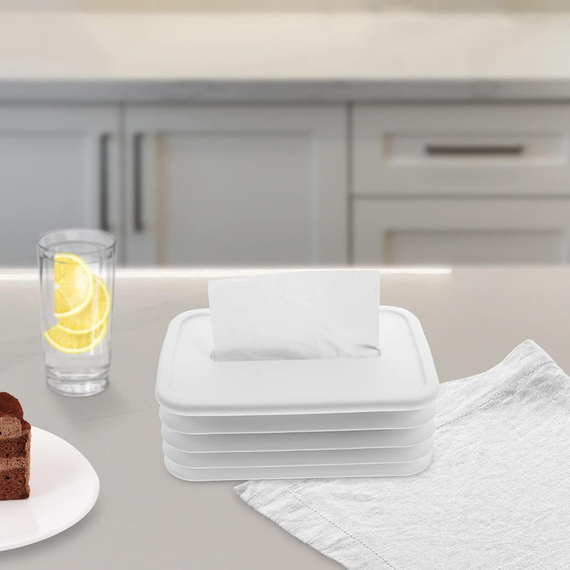 Foldable silicone tissue holder complements a modern living space.