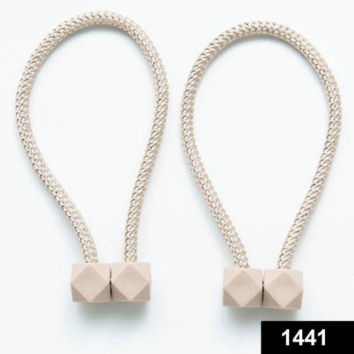 Close-up of a decorative magnetic curtain tieback, showcasing its strong hexagonal magnet.