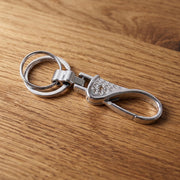 Heavy-duty metal key holder with swivel hook and chrome finish