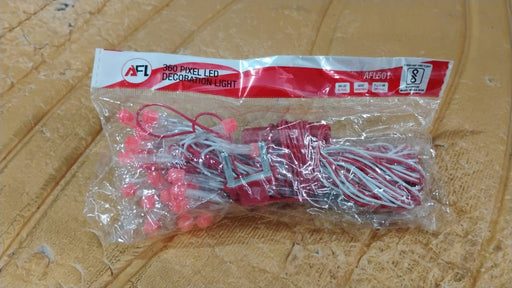 Stretch of 10 meter LED decorative string fairy lights glowing red in evening