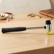Double head mallet showing rubber and nylon faces for various tasks