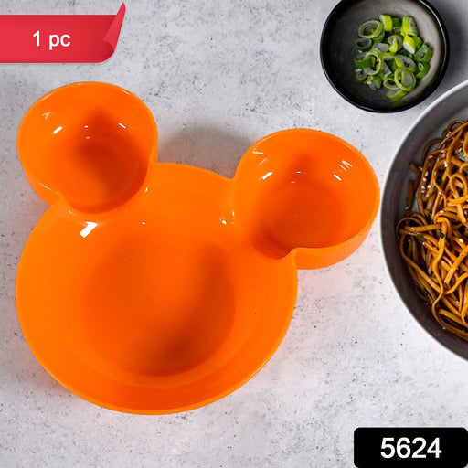 Stack of four colorful Mickey Mouse compartment plates in red, yellow, blue, and green.