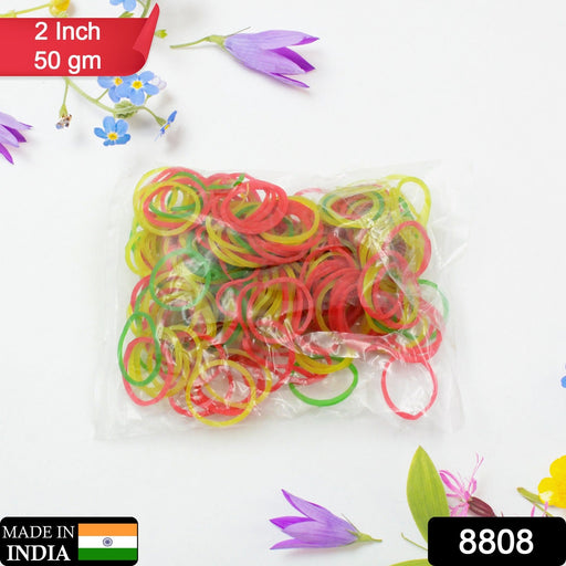 Multicolour rubber bands securely bundling a stack of papers and documents.
