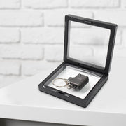 Close up of stainless steel nail clipper keychain ideal for travel grooming