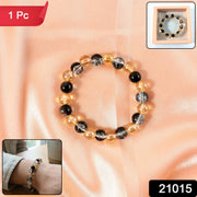 Dual-Tone Crystal Beaded Stretch Bracelet styled on wrist showcasing elegant sparkle