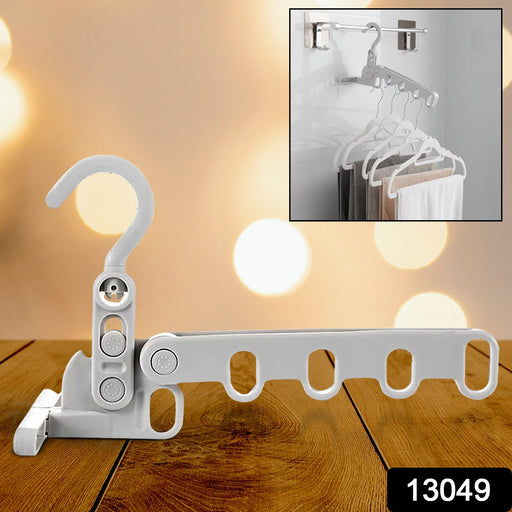 Compact folded clothes hanger, ideal for travel and space-saving storage.