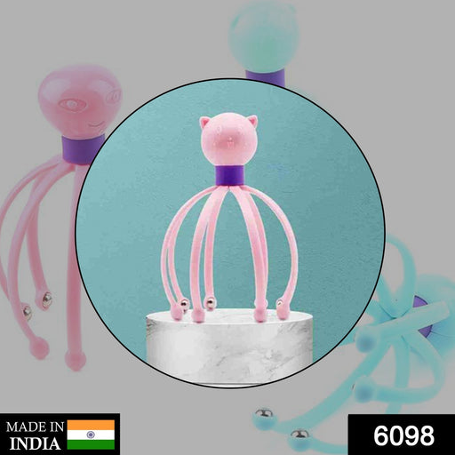 Close-up of the vibrating head massager's flexible claws on a scalp.
