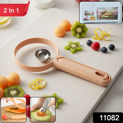 Close-up view of the fruit scooper side of the dual-function kitchen tool