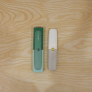User preparing food with the ChefAura multifunctional peeler and knife in a kitchen.