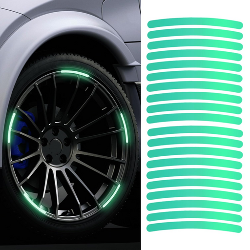 Multicolored reflective car wheel stickers applied to a dark car wheel, enhancing night visibility.