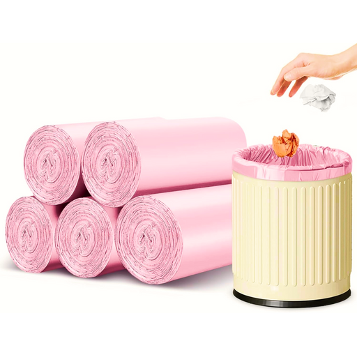 Compact roll of assorted color heavy duty garbage bags for waste management