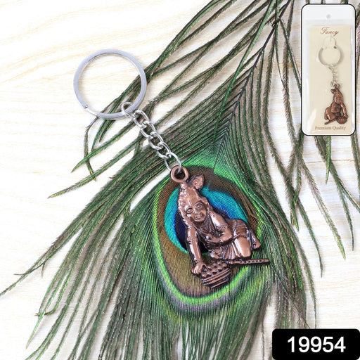 Close-up of detailed Bal Krishna crawling metal keychain