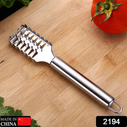 Close-up of the ergonomic handle on the fish scale remover scraper.