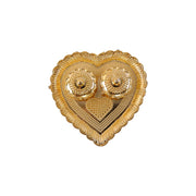 Kumkum holder with white background highlighting golden design
