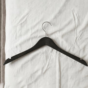 Hanger in use for wardrobe organization and clothes hanging