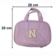 Size guide for travel toiletry organizer showing dimensions