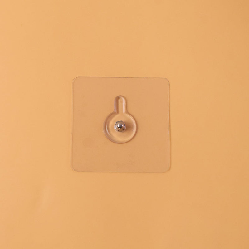 Adhesive wall hook in daily use for organization